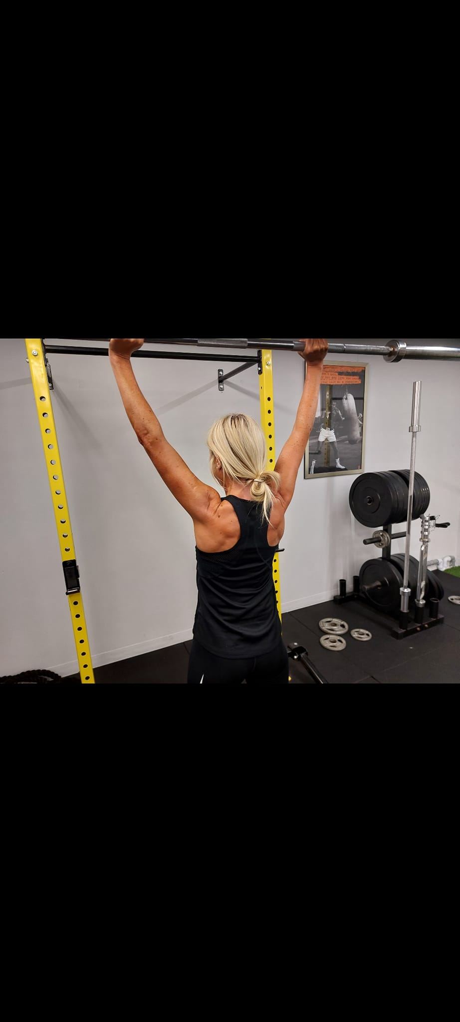 Pull-up bar work at Premium Fitness